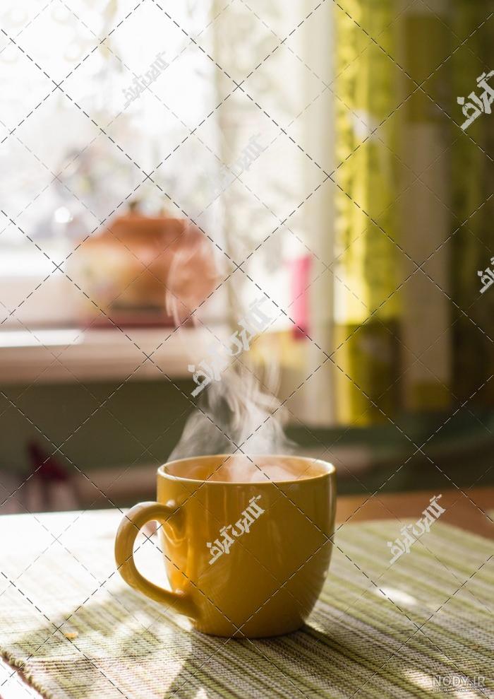 عکس فنجان چای و کتاب