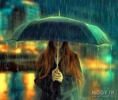 عکس دختر غمگین در باران