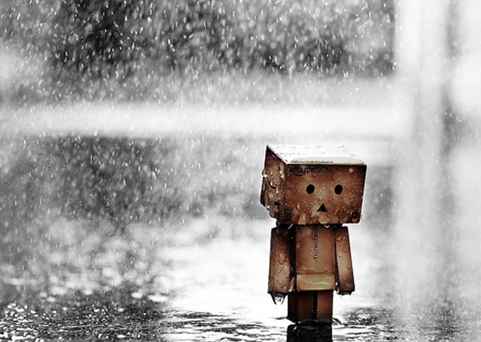 غمگین عکس دختر تنها در باران