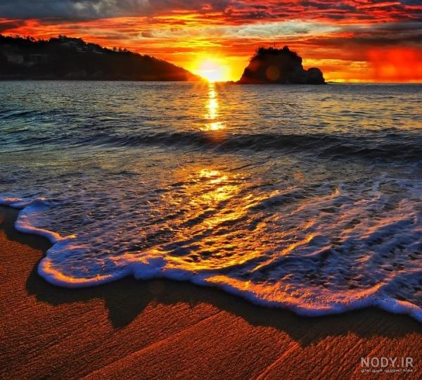 عکس طلوع خورشید در کنار دریا