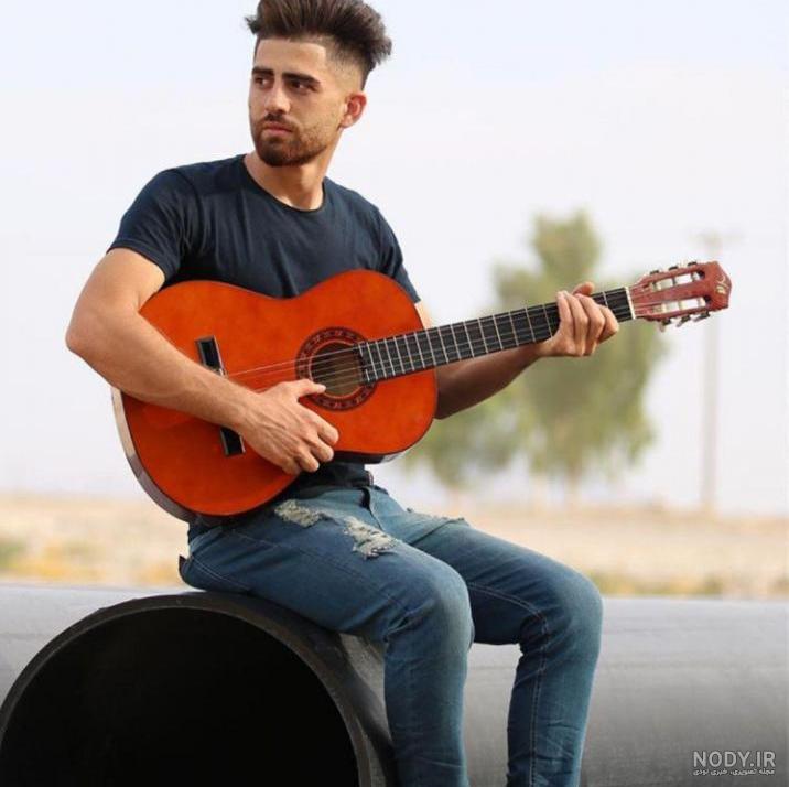  عکس پسر خوشگل با گیتار برای پروفایل