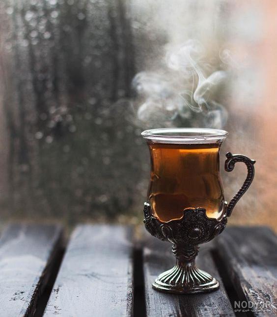 عکس فنجان چای در باران