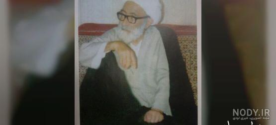 عکس حضرت علی اصغر در دست امام حسین