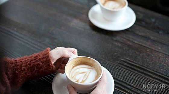 عکس فنجان قهوه در کافی شاپ