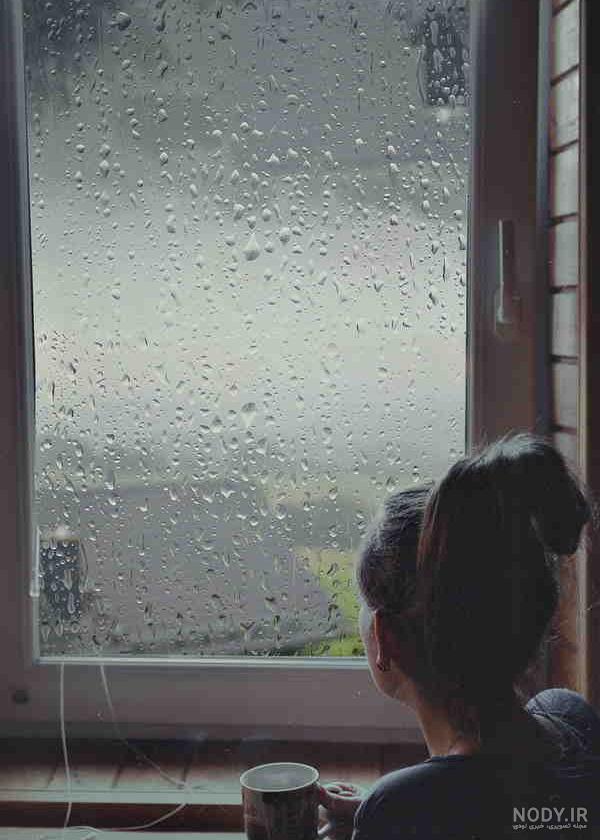 عکس متحرک باران پشت پنجره
