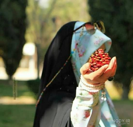 عکس دختر چادری با تفنگ عکس دختر چادری با تفنگ