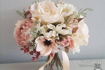 عکس دسته گل رز مصنوعی عکس دسته گل رز مصنوعی