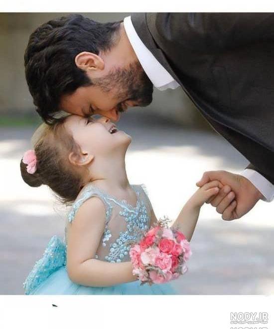 عکس پدر دختری غمگین