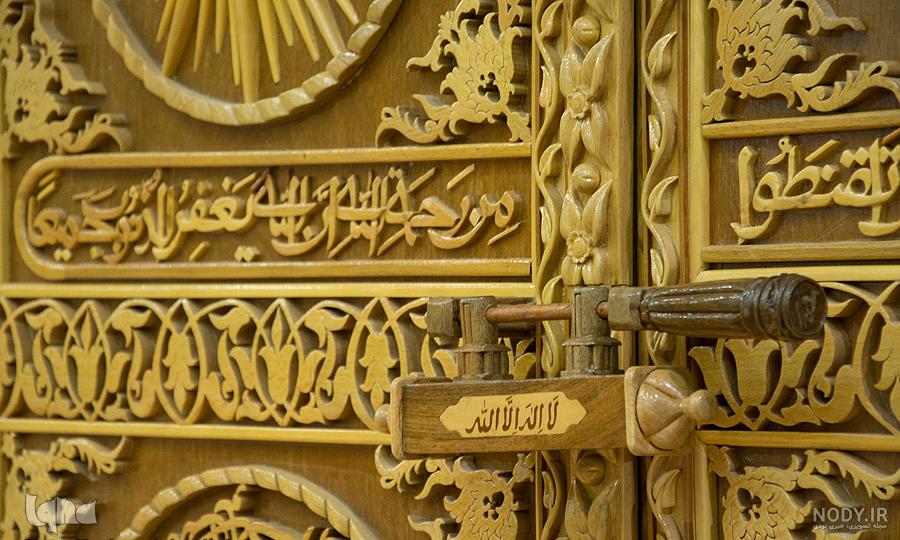 عکس حسن سازنده بزرگترین قرآن معرق جهان