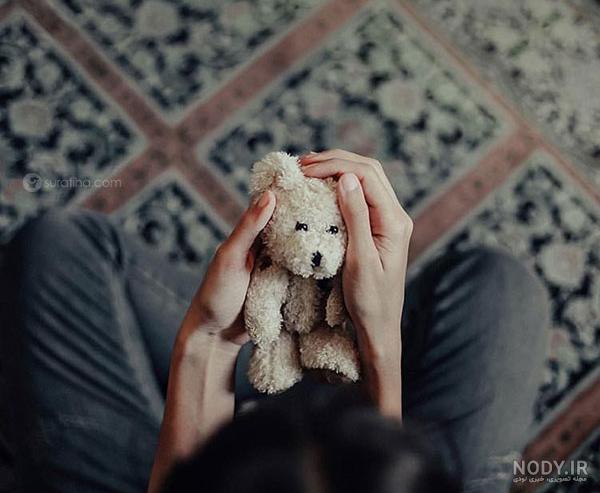 عکس خفن ایده عکاسی با عروسک بزرگسال