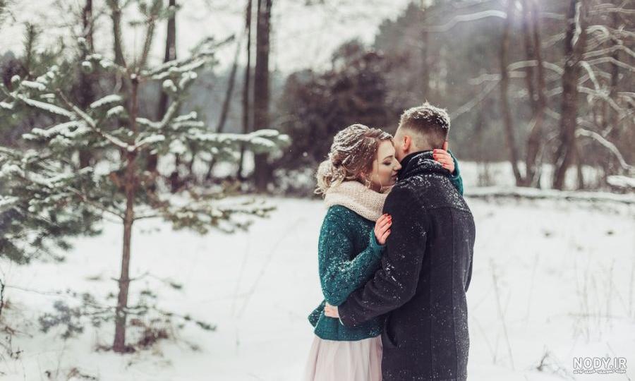 عکس عاشقانه دونفره زیر برف