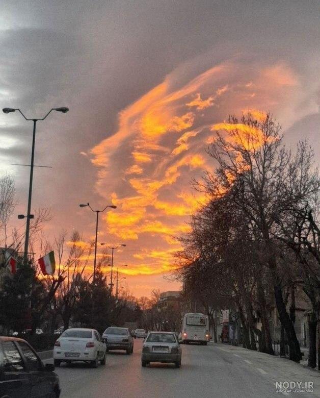 عکس طلوع خورشید از پشت پنجره