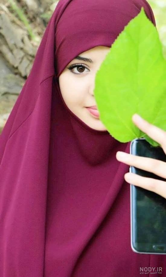 عکس دختر عربی با چفیه قرمز عکس دختر عربی با چفیه قرمز