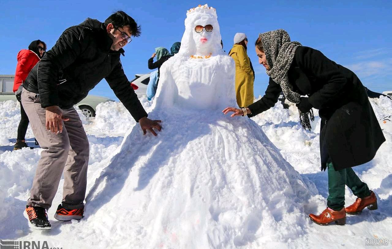 عکس آدم برفی در حال آب شدن عکس آدم برفی در حال آب شدن