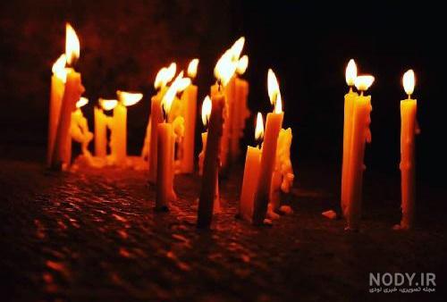 عکس شمع در تاریکی