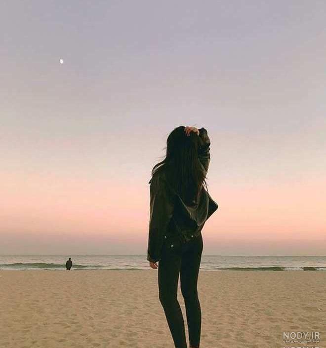 عکس دختر کنار دریا با مانتو