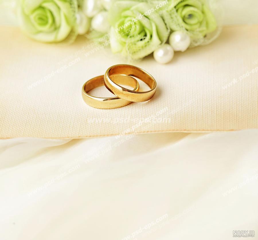 عکس حلقه ازدواج طرح گل عکس حلقه ازدواج طرح گل