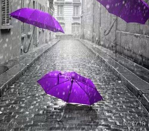 عکس چتر و باران دخترانه