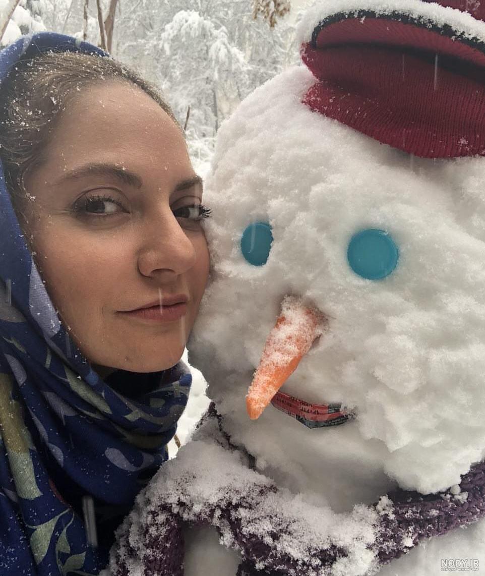 عکس سلفی با آدم برفی