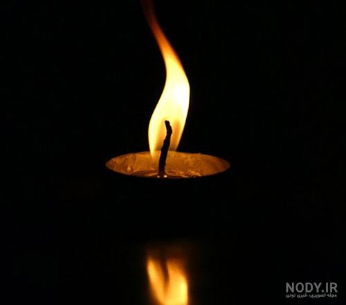 عکس شمع و زمینه سیاه