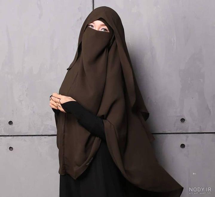 عکس دختر چادری با تفنگ عکس دختر چادری با تفنگ