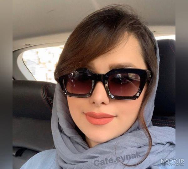 عکس دختر با عینک دودی و کلاه عکس دختر با عینک دودی و کلاه