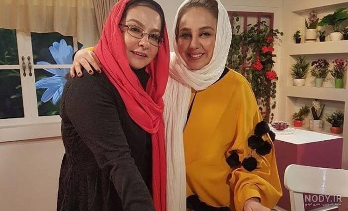 عکس بارداری با لباس نوزاد عکس بارداری با لباس نوزاد