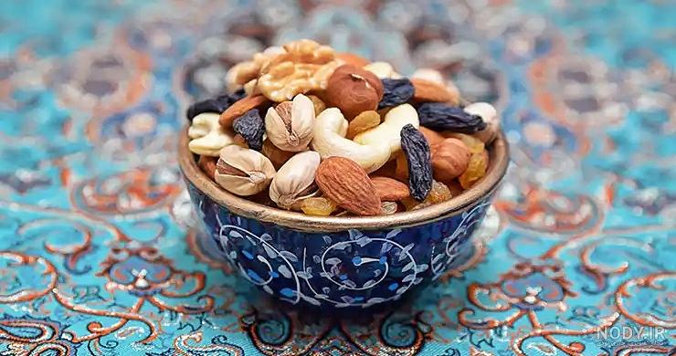 تزیین آجیل در ظرف گرد