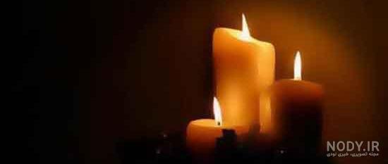 عکس شمع در تاریکی