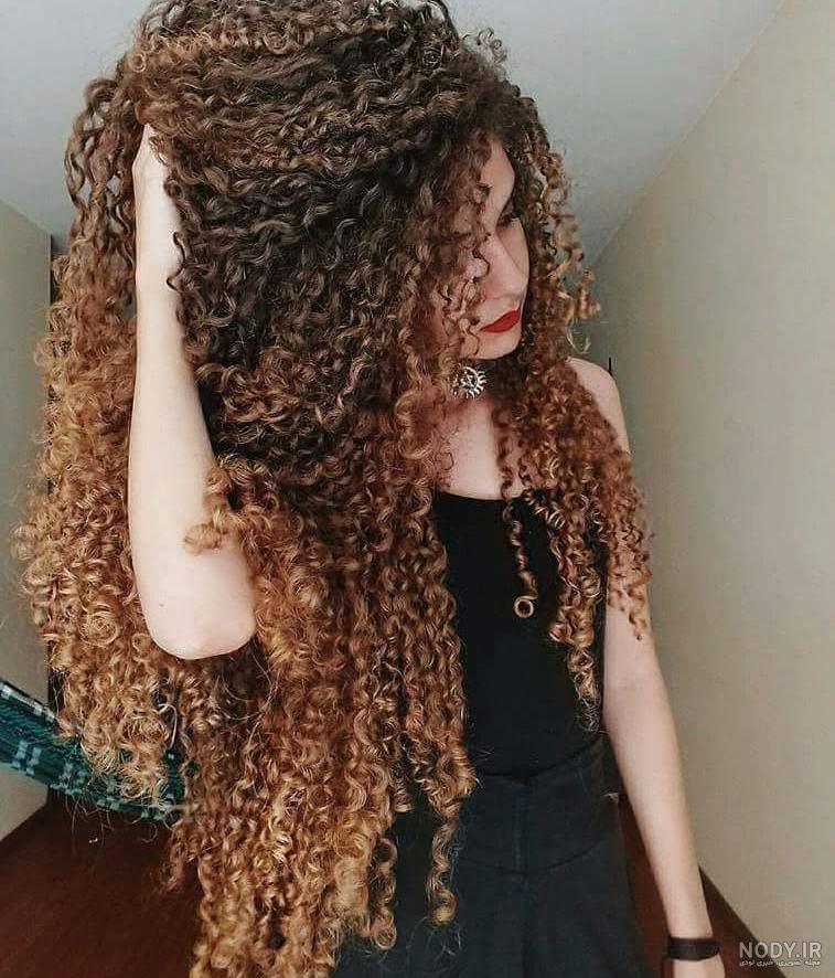 عکس خفن عکس دختر از پشت سر با موهای باز مشکی