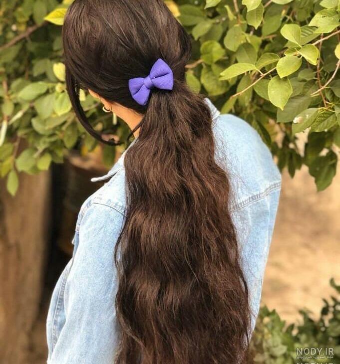 عکس خفن عکس دختر از پشت سر با موهای باز مشکی