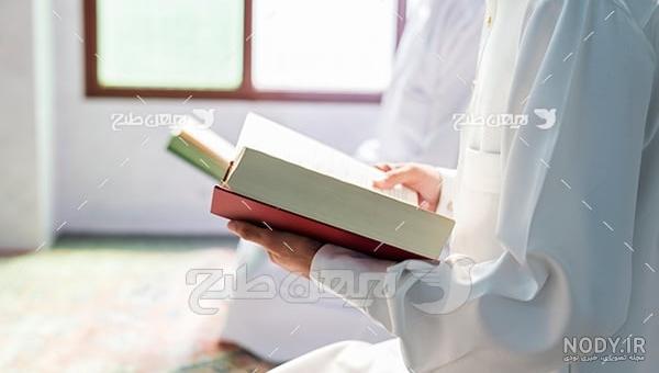 عکس قران در دست دختر عکس قران در دست دختر
