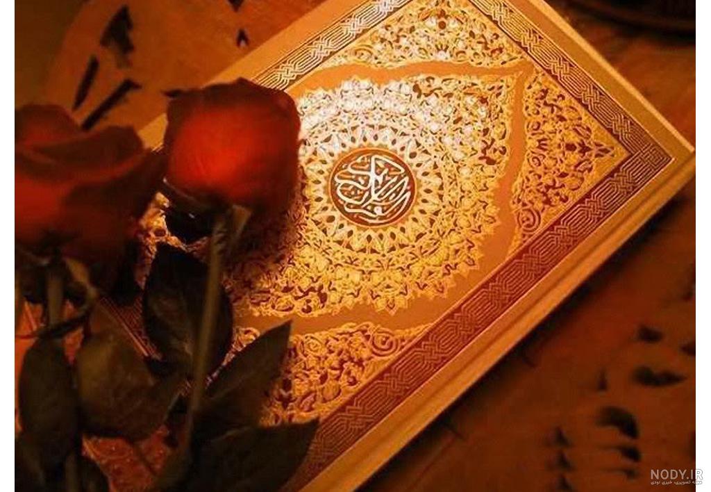عکس قران و تسبیح در دست