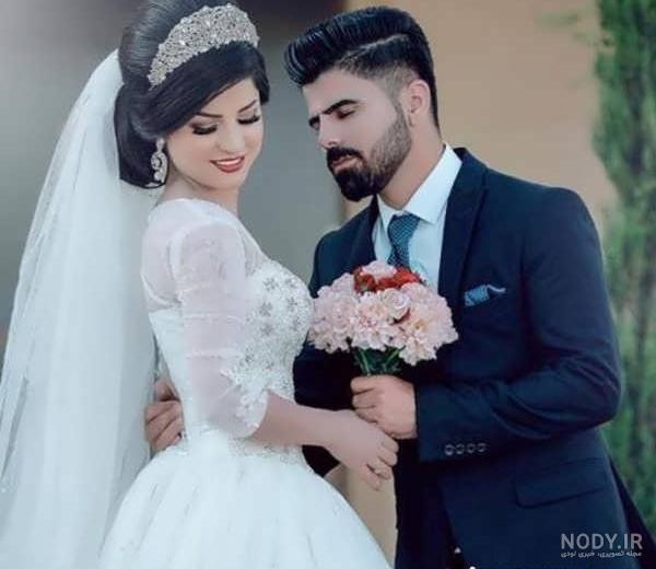 ژست عکس سرمجلسی عروس و داماد