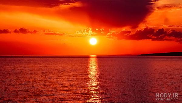 عکس خفن عکس طلوع خورشید روی دریا