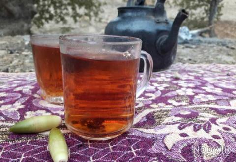 عکس فنجان چای در طبیعت عکس فنجان چای در طبیعت