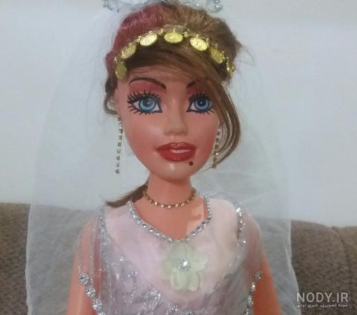 عروسک با لباس عروس