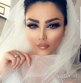 عکس عروس و داماد در باغ