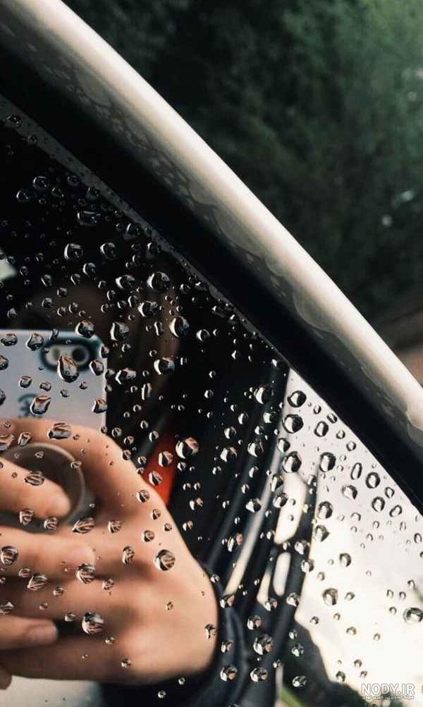 عکس زیر باران تنهایی