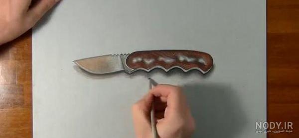 عکس نقاشی چاقو چوبی