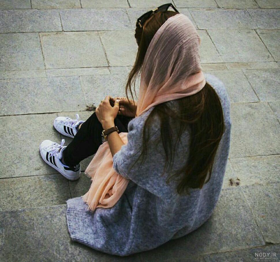 عکس دختر غمگین با کلاه