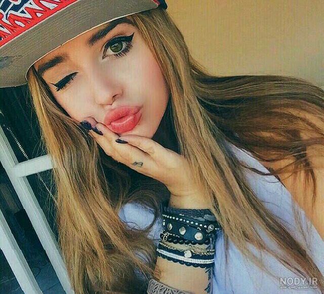 عکس دختر لاتی با کلاه عکس دختر لاتی با کلاه
