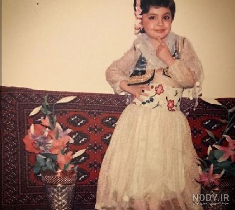 جواد عزتی و همسرش در شنای پروانه جواد عزتی و همسرش در شنای پروانه