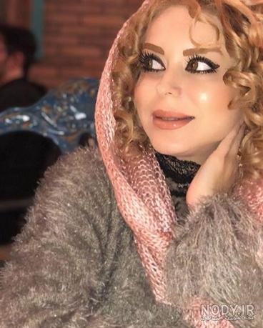 میترا اویسی و همسرش میترا اویسی و همسرش