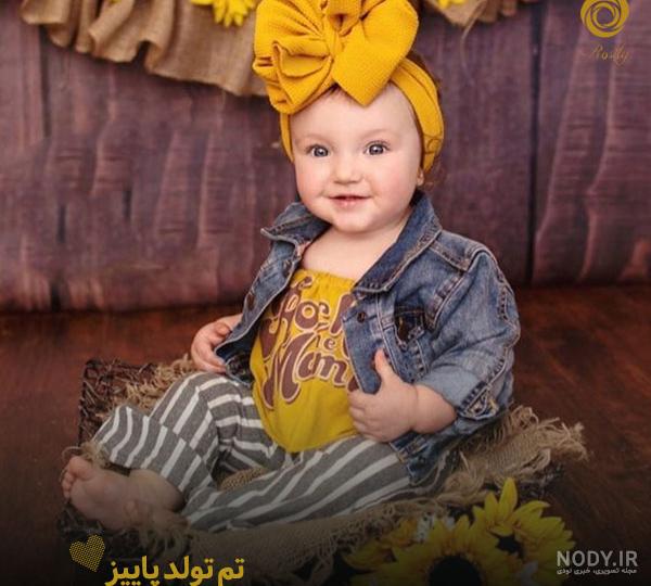 عکس برگ پاییزی در دست دختر عکس برگ پاییزی در دست دختر