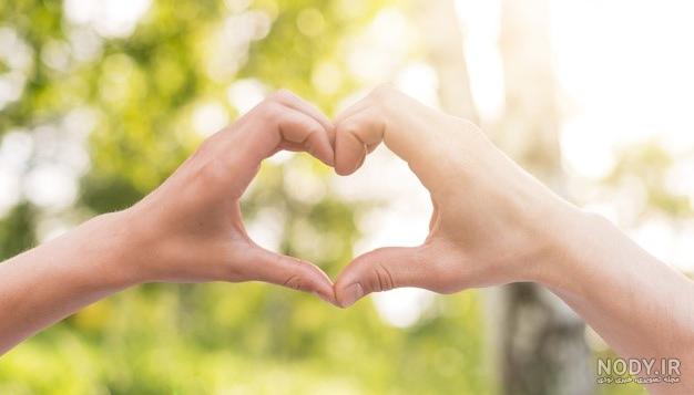 عکس قلب در دست دختر عکس قلب در دست دختر