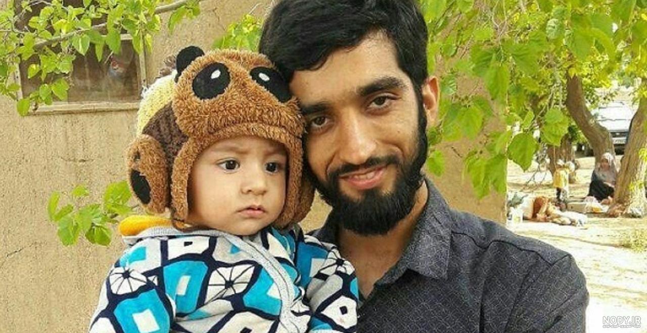 عکس شهید حججی با پسرش عکس شهید حججی با پسرش