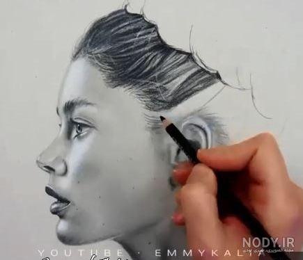 نقاشی نیم رخ دختر و پسر
