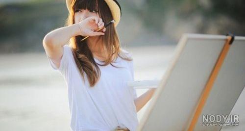 ژست عکاسی با تابلو نقاشی