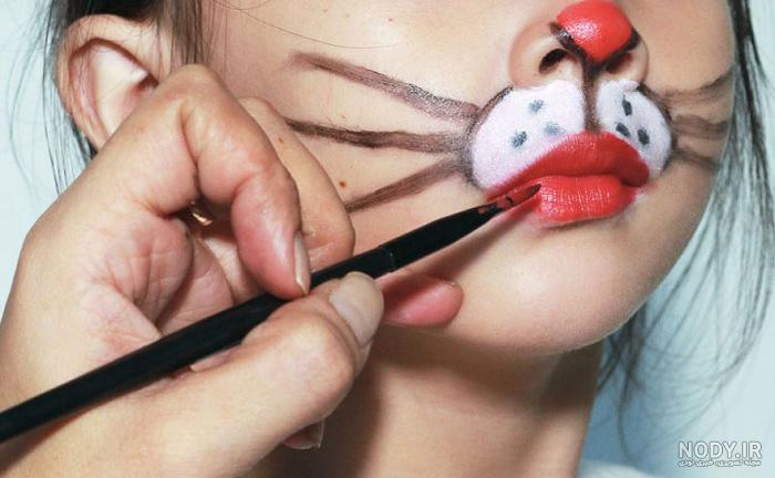 نقاشی روی صورت پروانه نقاشی روی صورت پروانه